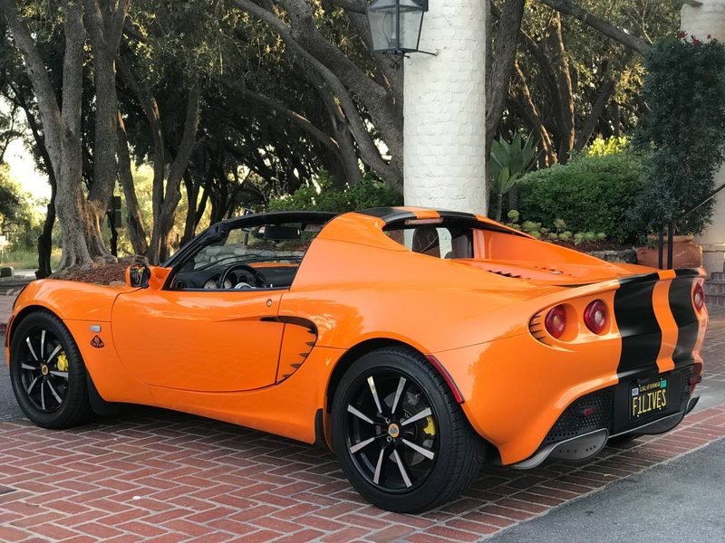 Illustration for article titled For $29,999, Could This Orange And Black 2005 Lotus Elise Have You Ready For Halloween?